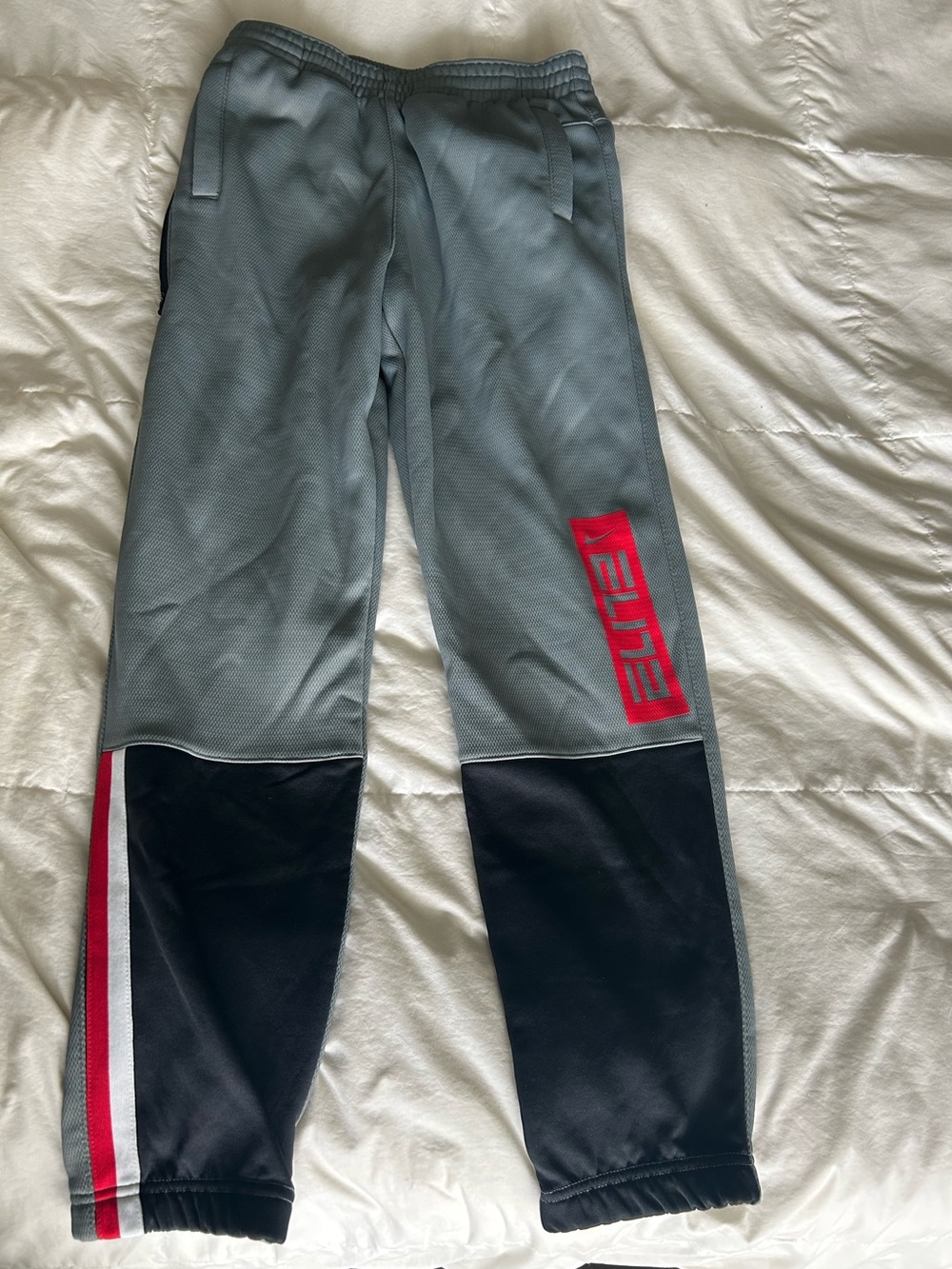 Nike Dri fit Grey and Black Joggers with Red Accent. New w/o tags. Youth XL.